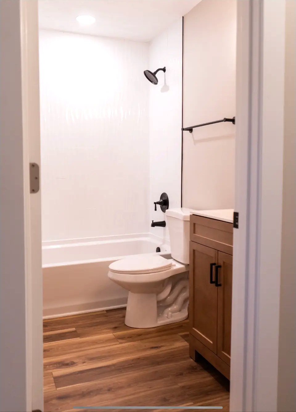 Full Bath Remodel with Wood Vanity & Tub Surround